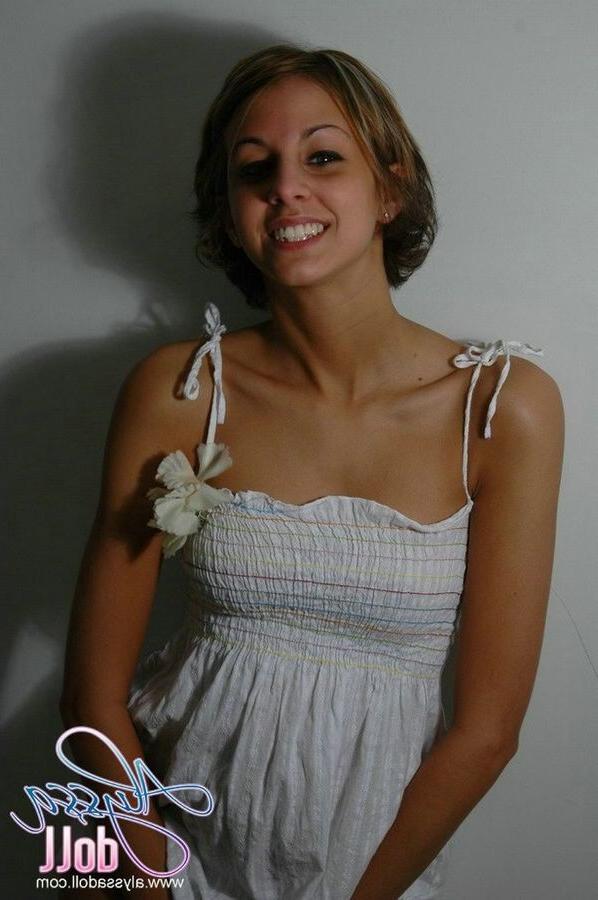 15P Cute Alyssa posing and teasing in a white baby doll dress