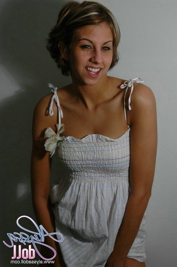 15P Cute Alyssa posing and teasing in a white baby doll dress