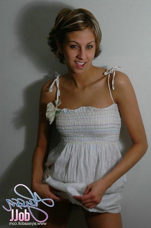 15P Cute Alyssa posing and teasing in a white baby doll dress