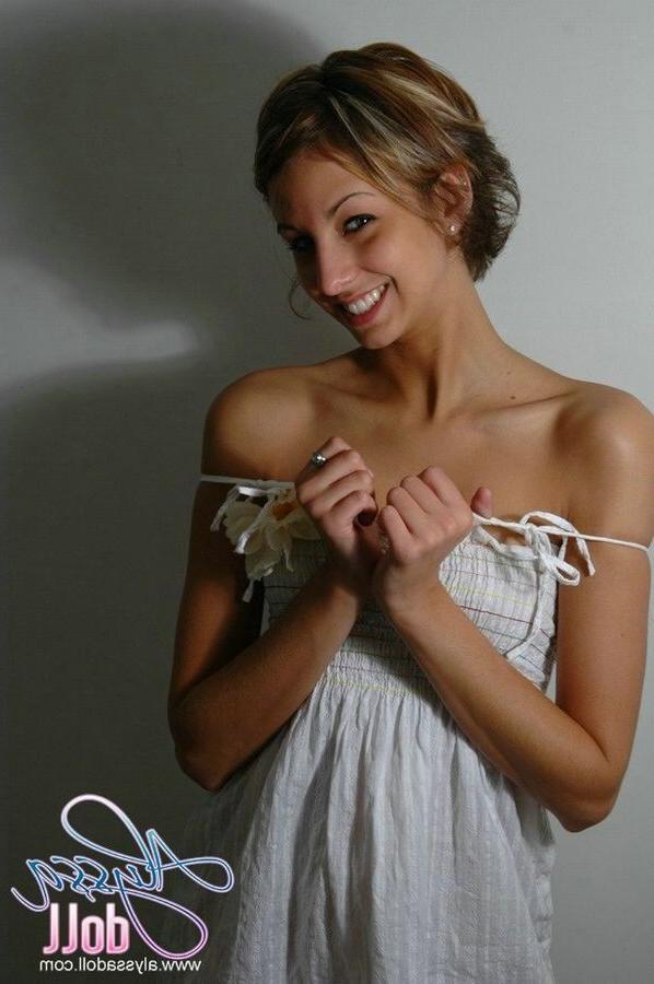 15P Cute Alyssa posing and teasing in a white baby doll dress
