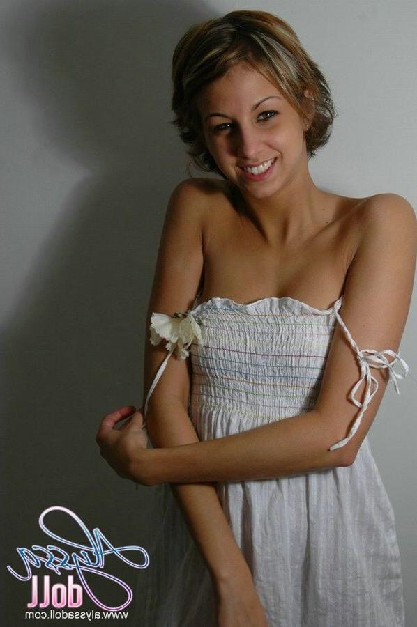15P Cute Alyssa posing and teasing in a white baby doll dress