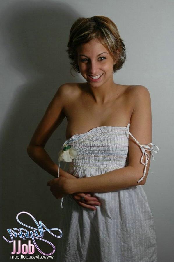 15P Cute Alyssa posing and teasing in a white baby doll dress