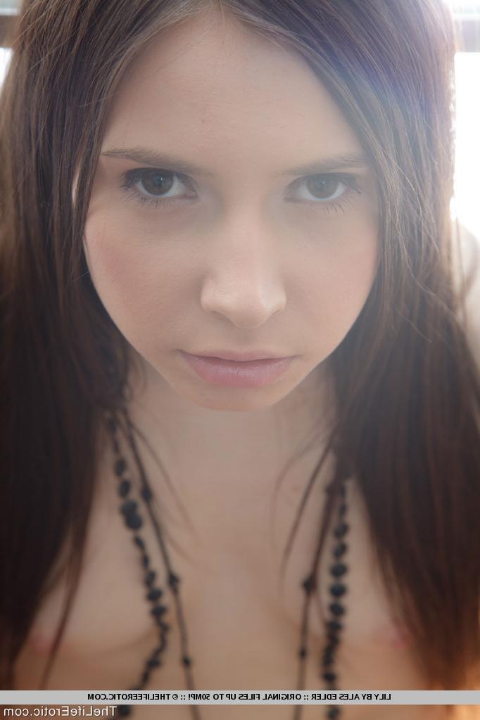 16P gorgeous pale doll shows her pussy
