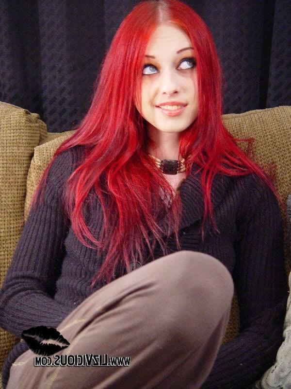 18P Redhead goth chick liz vicious posing on the couch