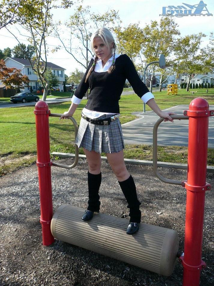 15P Anna Angel at the park teasing in a sexy schoolgirl outfit