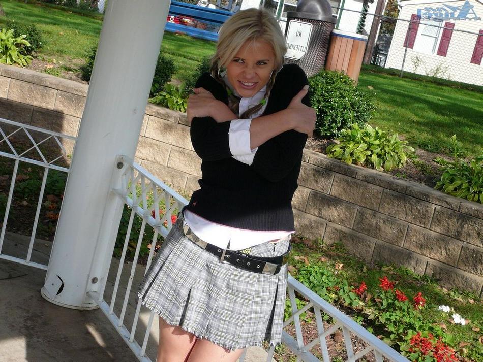 15P Anna Angel at the park teasing in a sexy schoolgirl outfit
