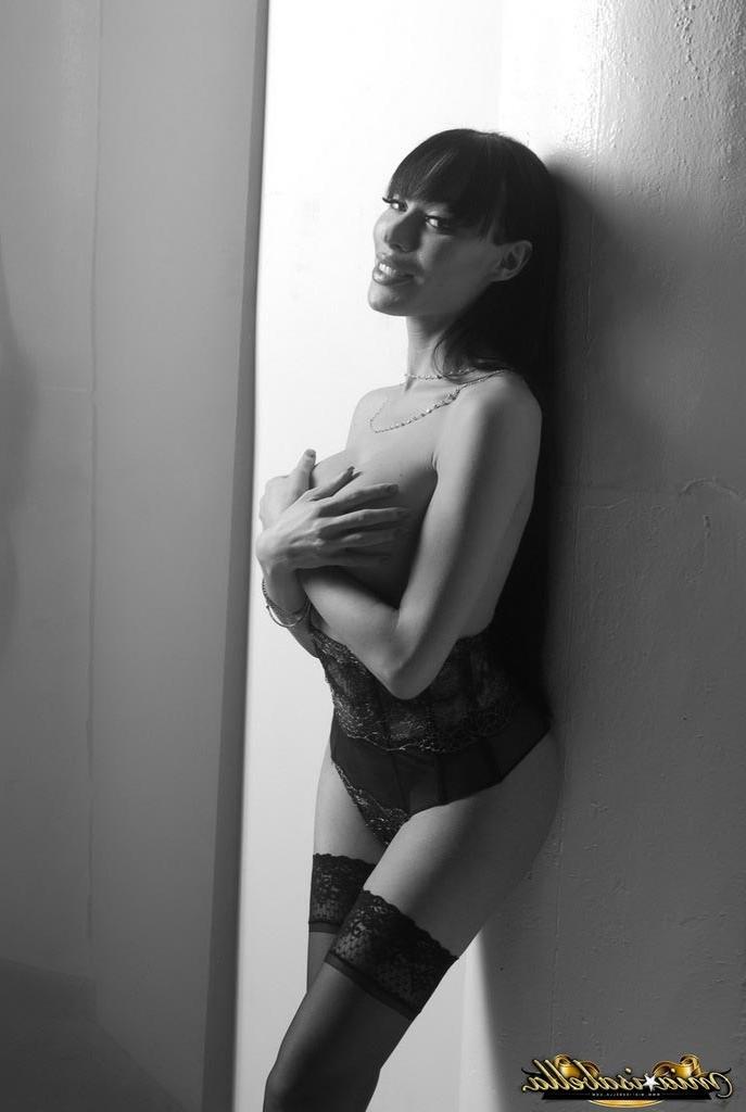 12P Shemale Mia Isabella shows off her long cock in a beautiful BW pictorial