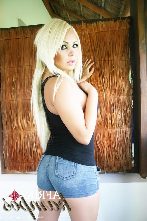 13P Hot blonde shemale Afrika Kampos posing outdoors