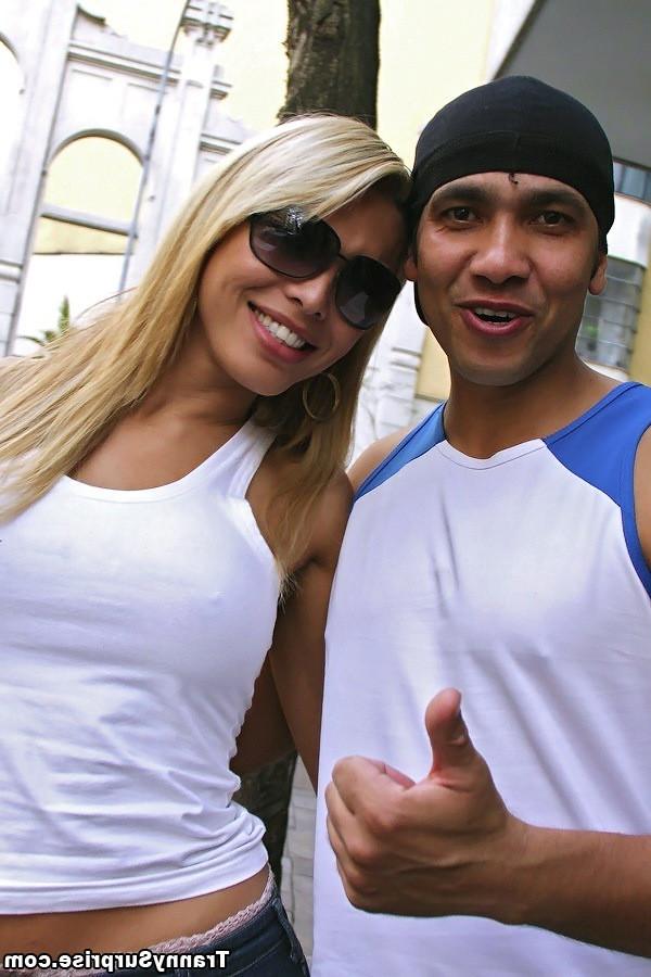 20P A blonde shemale gets nude and pleases cock with oral sex