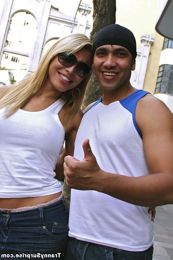 20P A blonde shemale gets nude and pleases cock with oral sex