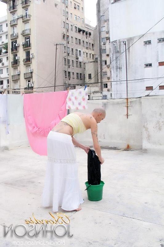 12P Bald shemale hanging clothes and stroking her shecock