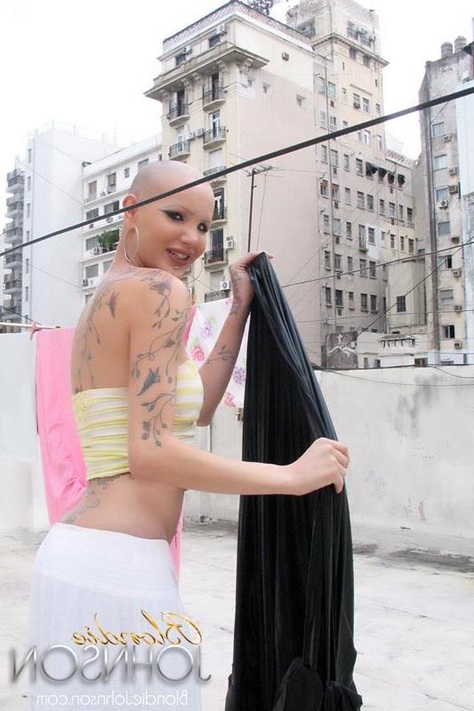 12P Bald shemale hanging clothes and stroking her shecock