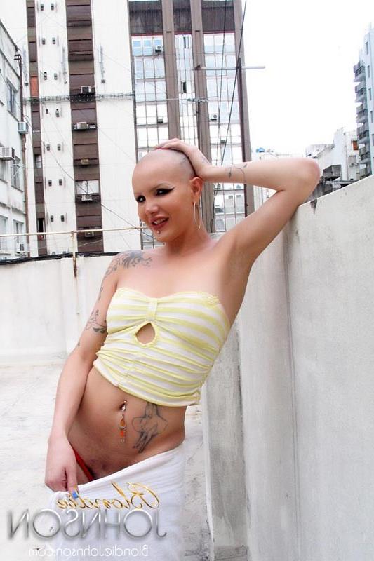 12P Bald shemale hanging clothes and stroking her shecock