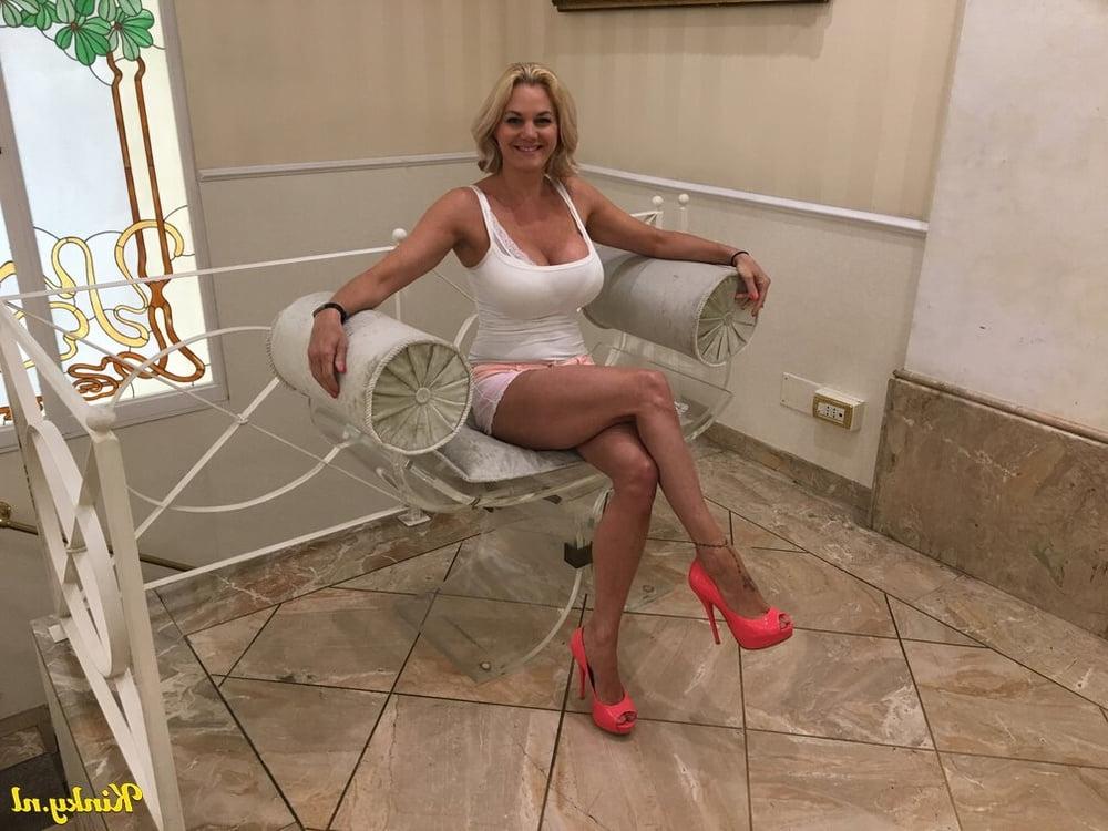 25P Cecilie: Dutch Escort with huge fake tits!