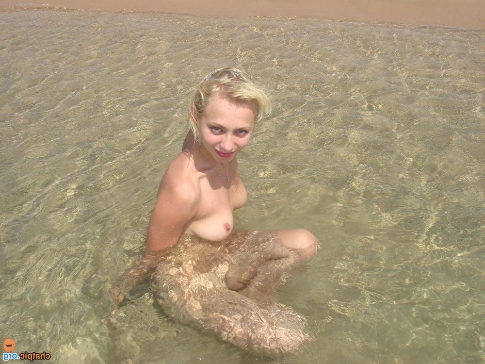 25P blonde slim webslut with great tits and shaved pussy