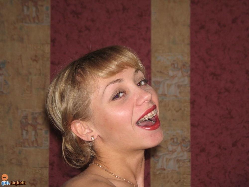 25P blonde slim webslut with great tits and shaved pussy