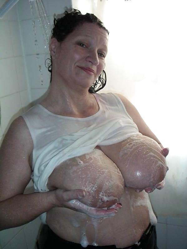 14P Buxom granny black girdle wet white tee shirt washes breasts
