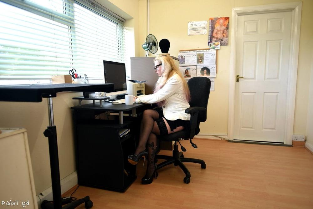 25P Buxom blonde T strips off in the office
