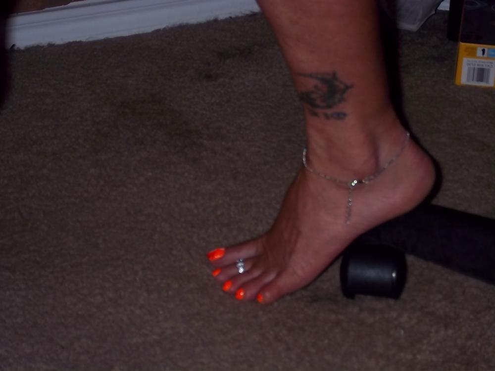 15P Chance's long tan legs and neon orange toes