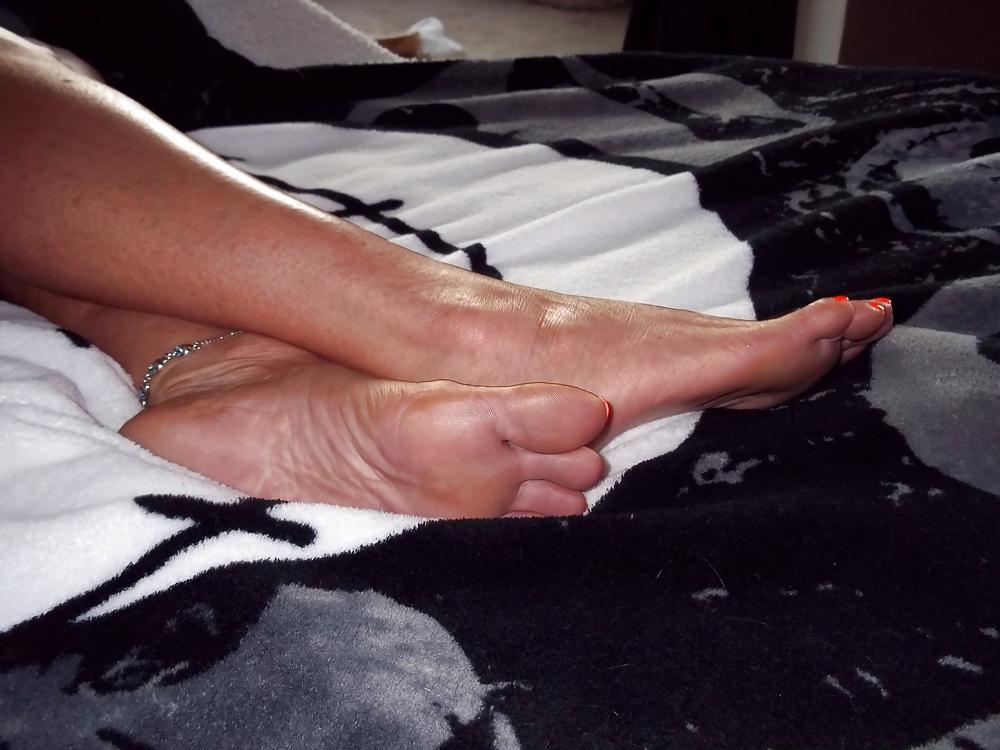 15P Chance's long tan legs and neon orange toes