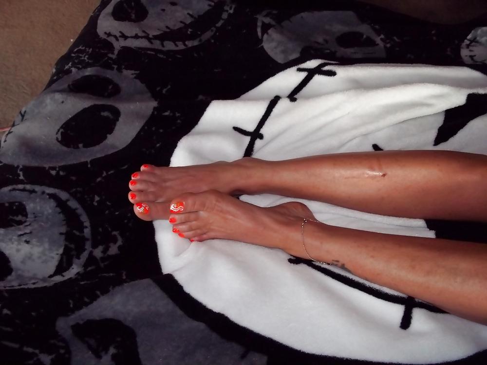 15P Chance's long tan legs and neon orange toes