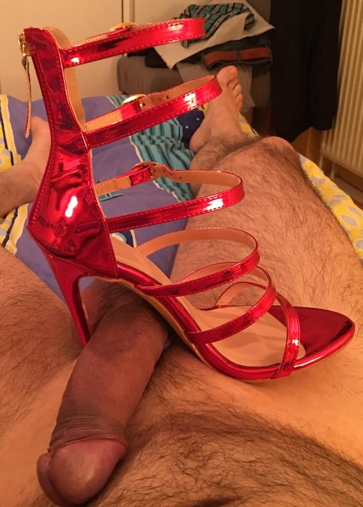 8P my cock under the heels of my wife's high heels