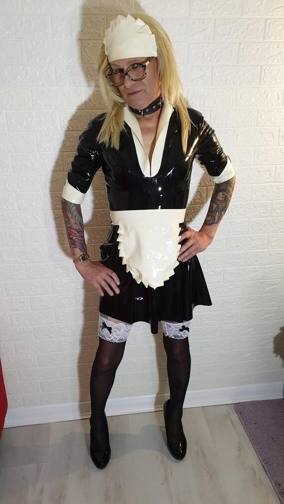 25P Latex Maid Charlotte With Domme Lisa.