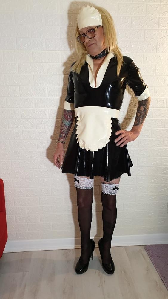 25P Latex Maid Charlotte With Domme Lisa.
