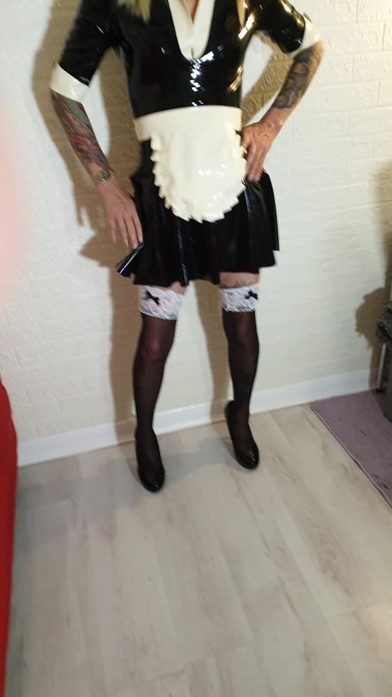 25P Latex Maid Charlotte With Domme Lisa.