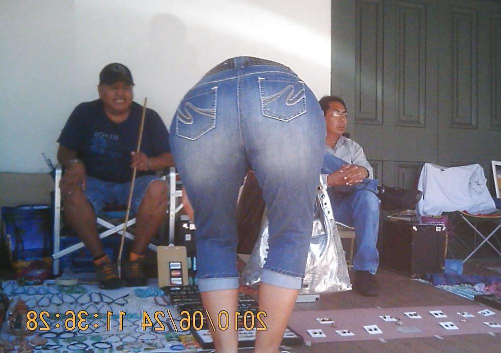 14P Mature Bending Over at a Market