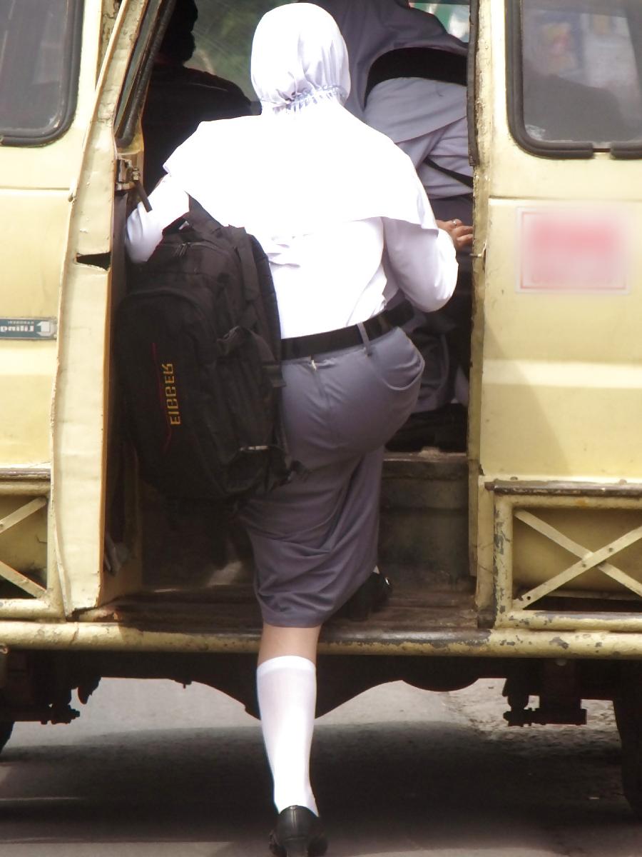 8P Schoolgirl Hijab's Ass Looks Sexy When Riding Public Trans