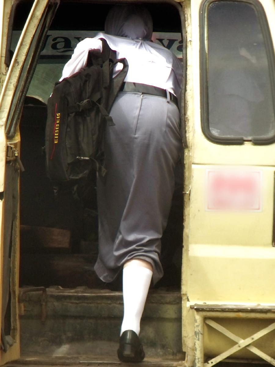 8P Schoolgirl Hijab's Ass Looks Sexy When Riding Public Trans