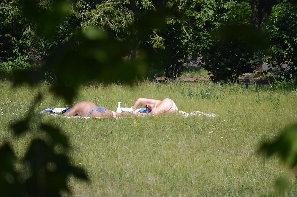 9P Girl sunbathing in the park 2