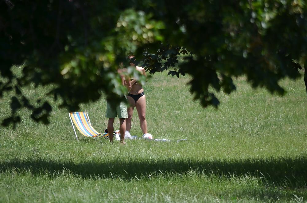 25P Girl sunbathing in the park I