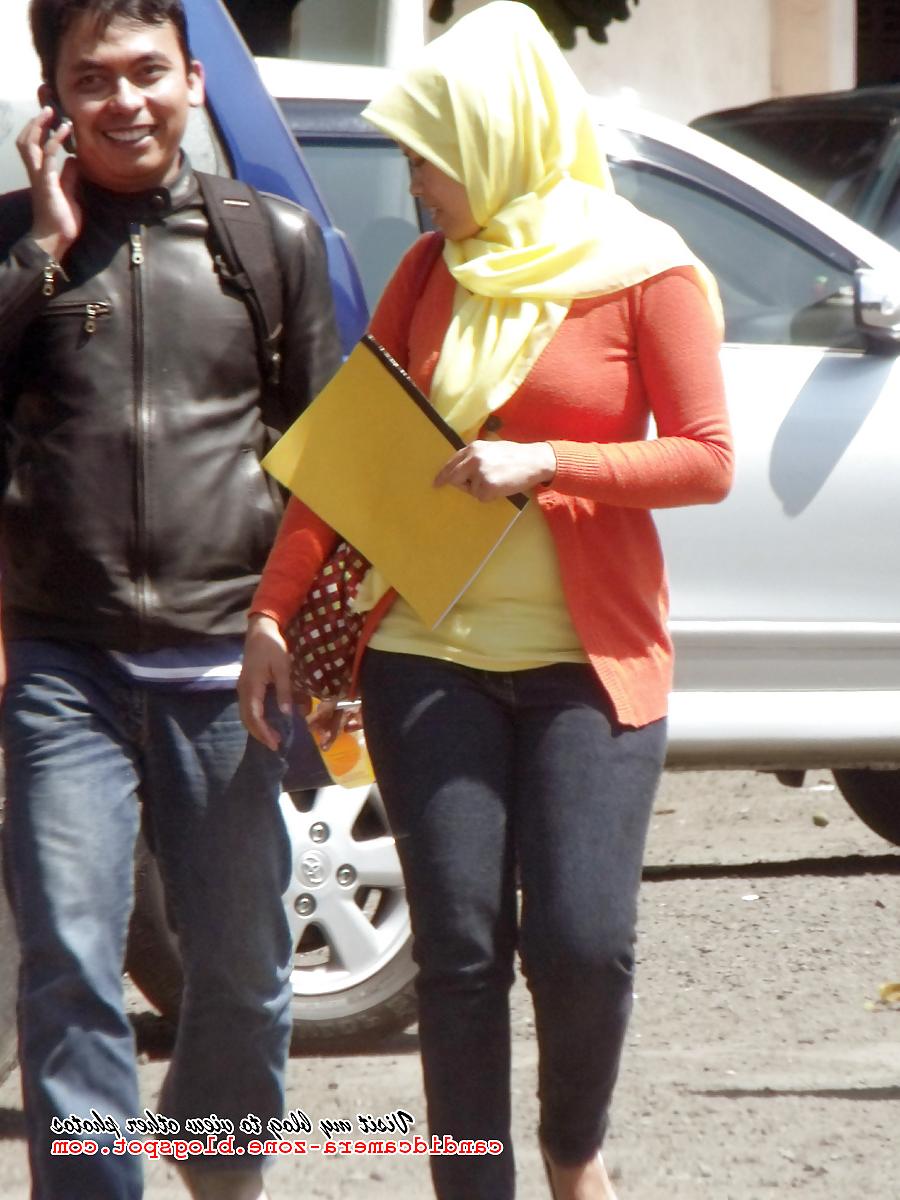 12P Candid Sexy Teen in Hijab, Tight Shirt & Tight Jeans