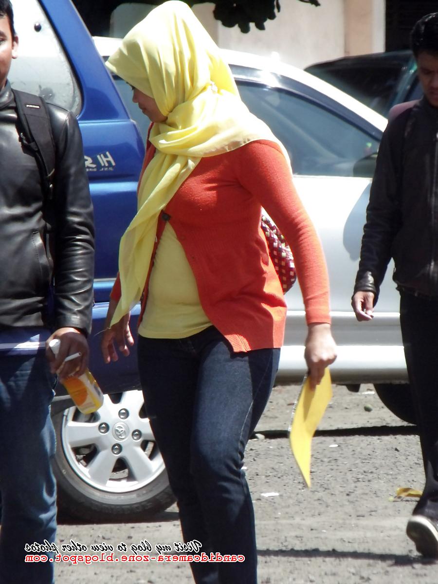 12P Candid Sexy Teen in Hijab, Tight Shirt & Tight Jeans