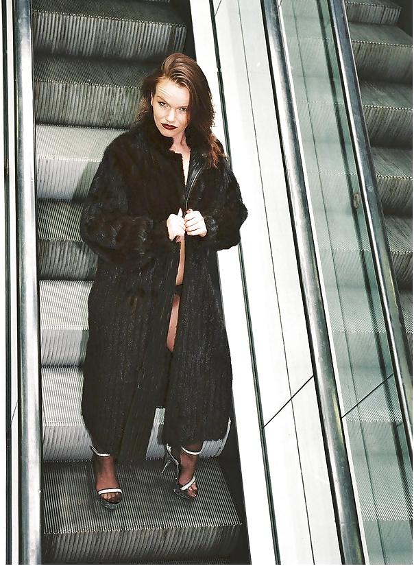 25P Out and about in a fur and black stockings