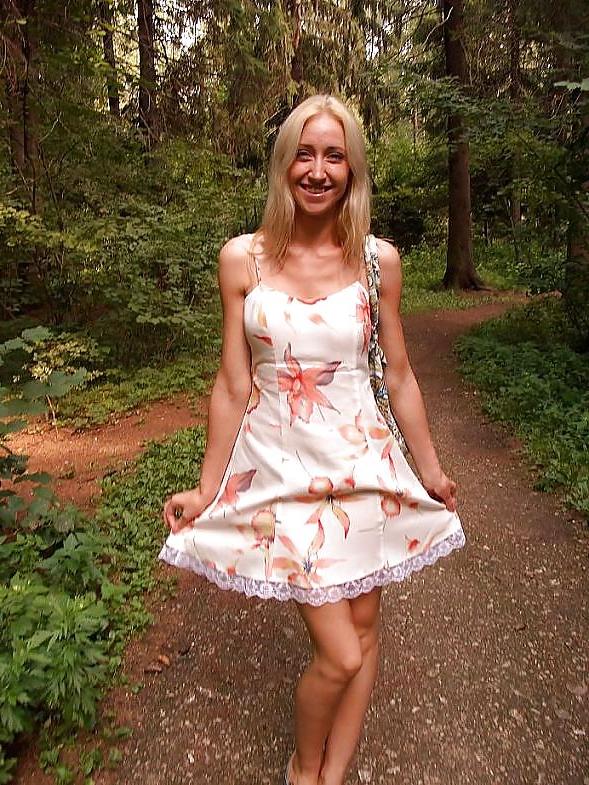 18P Blonde girl posing in the forest - N. C.
