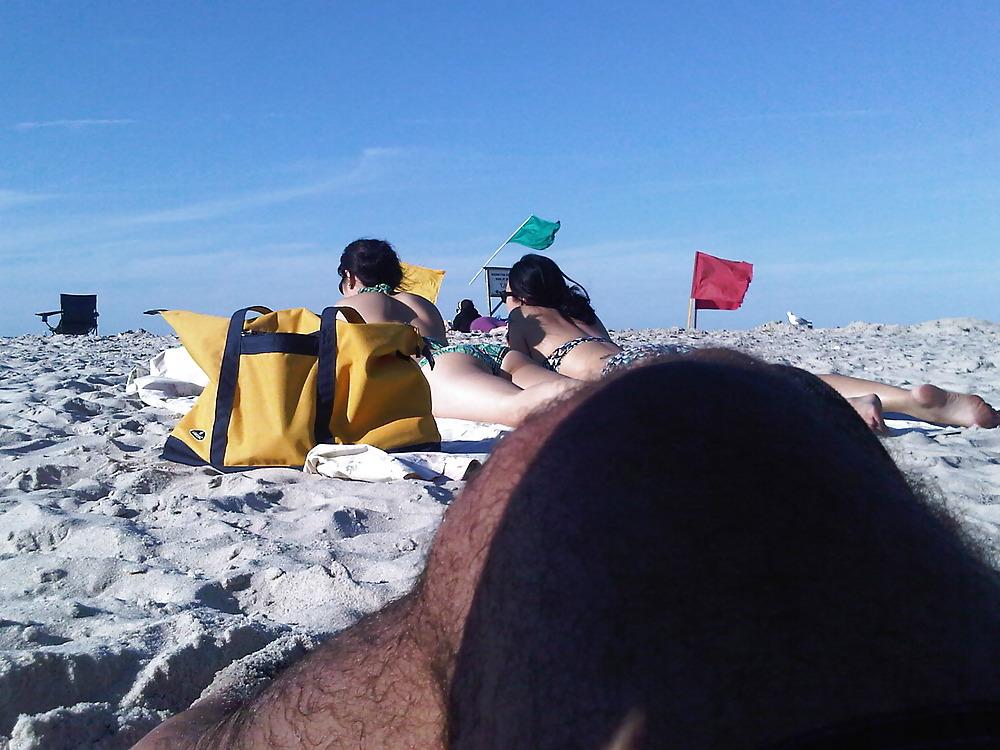 18P Asians laying on the beach