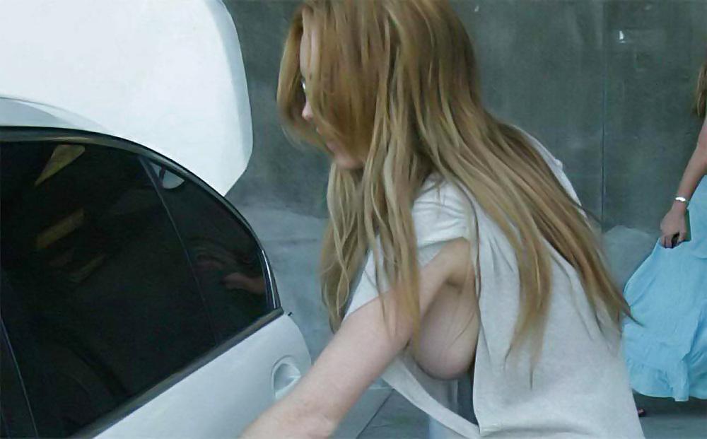 10P Lindsay Lohan ... Side Boob Front Of Her Car