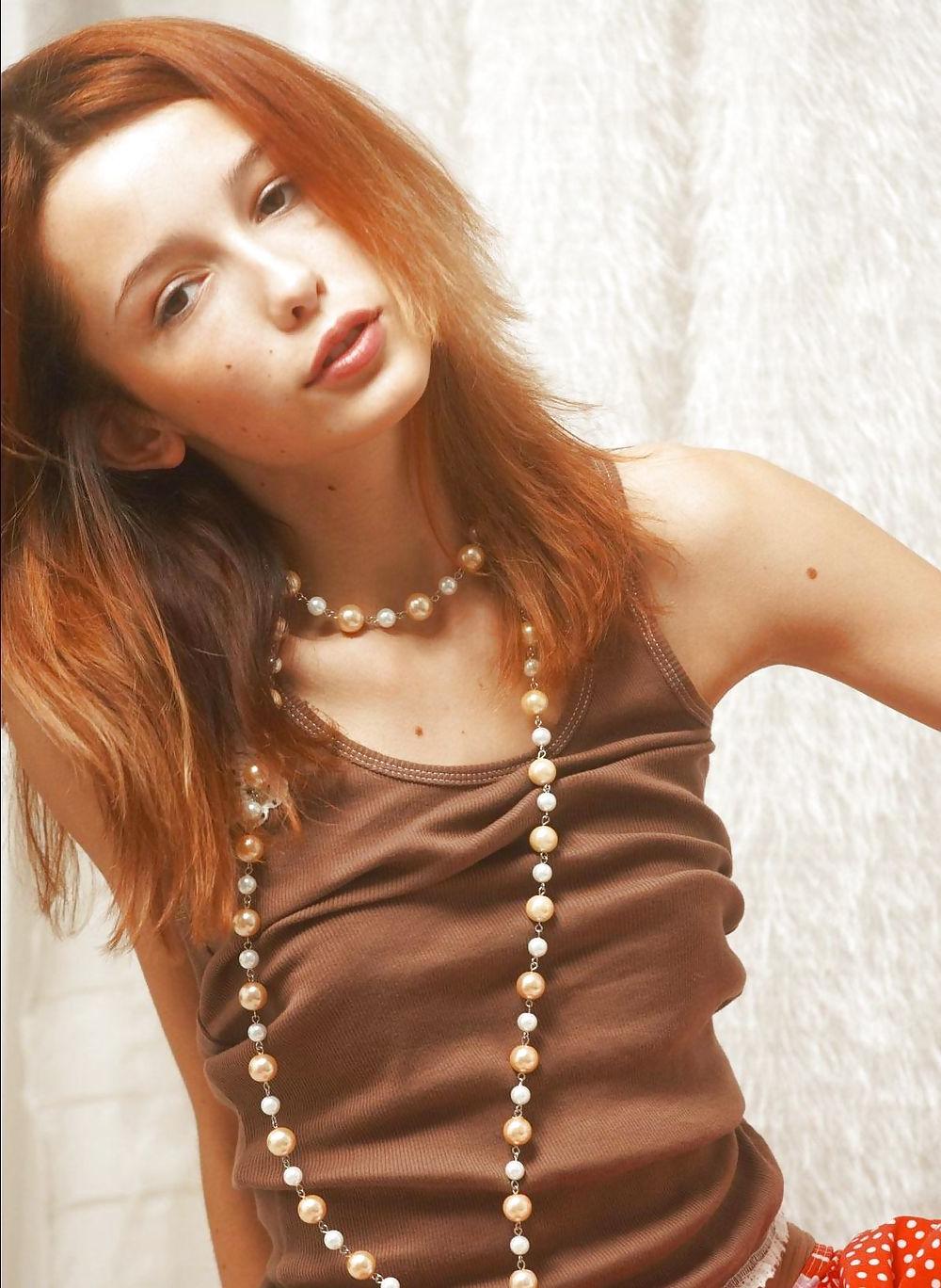 25P Skinny redhead with tiny tits