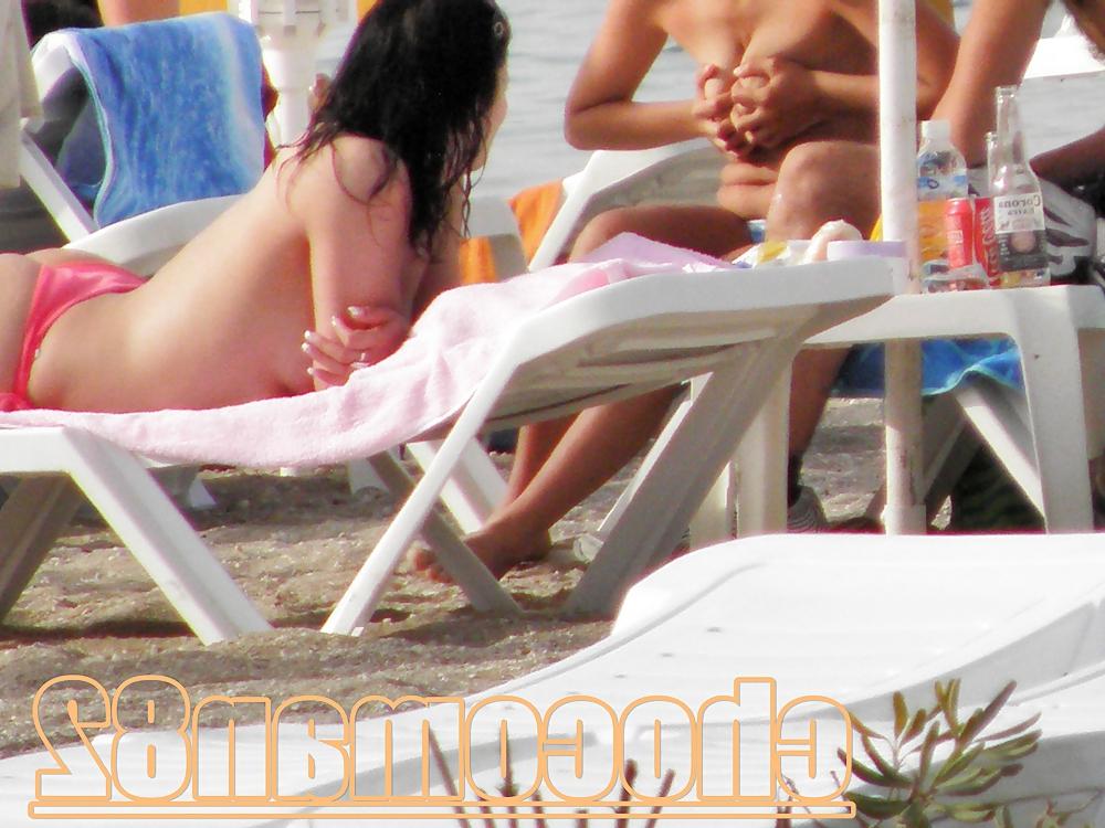 21P Miami beach topless two girls