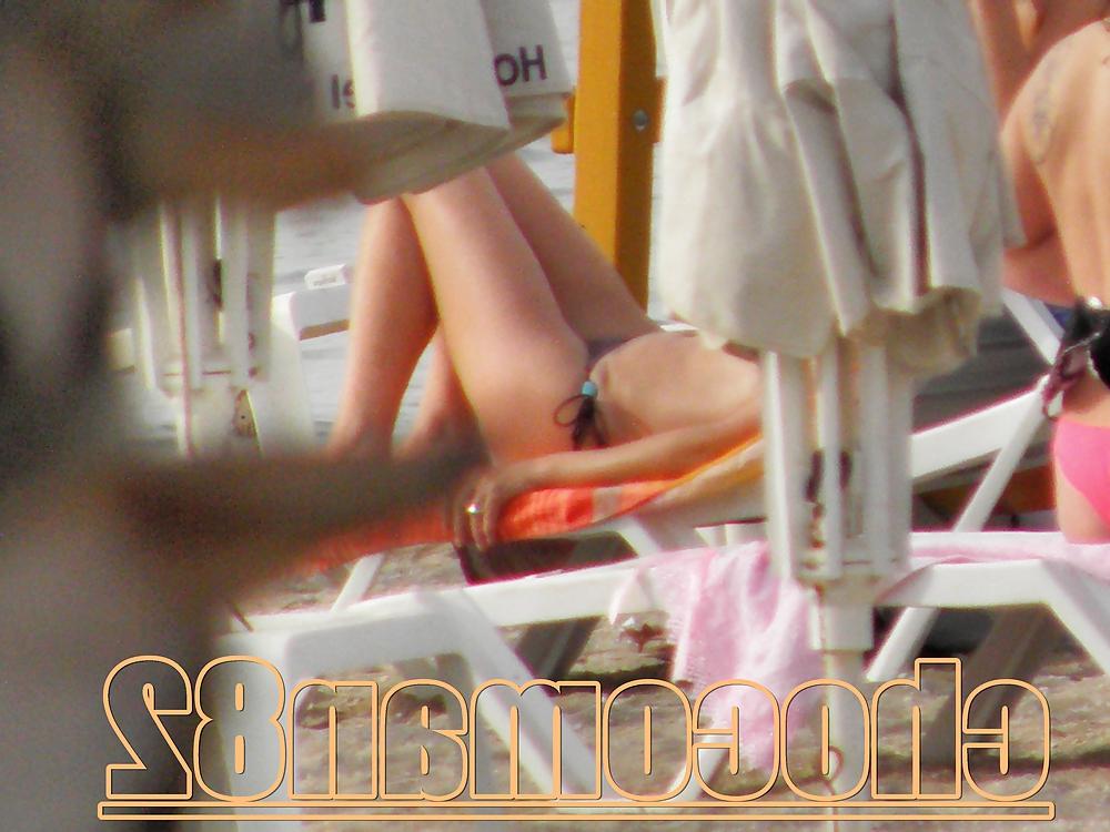 21P Miami beach topless two girls
