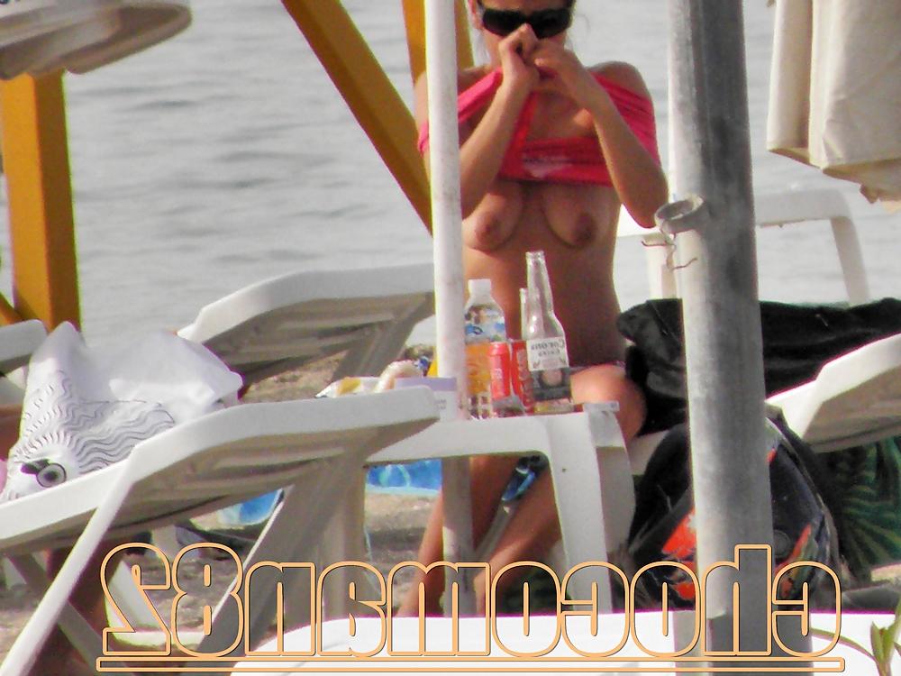 21P Miami beach topless two girls