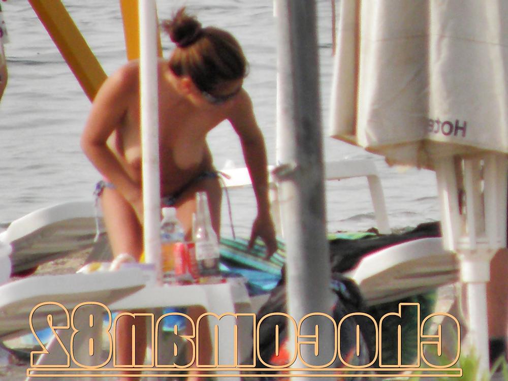 21P Miami beach topless two girls