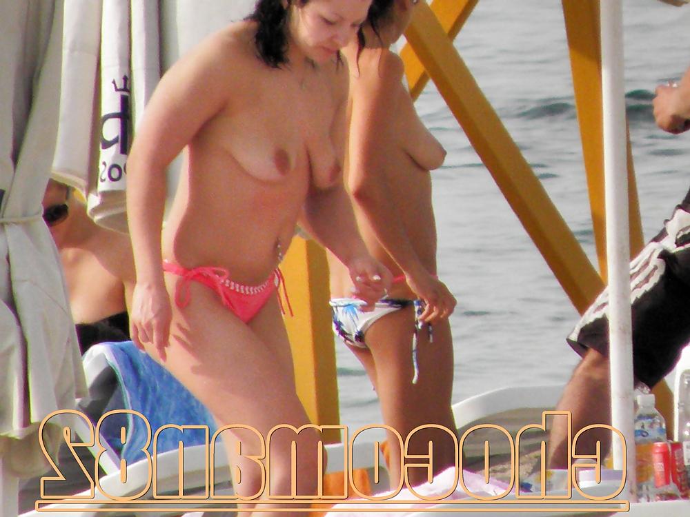21P Miami beach topless two girls