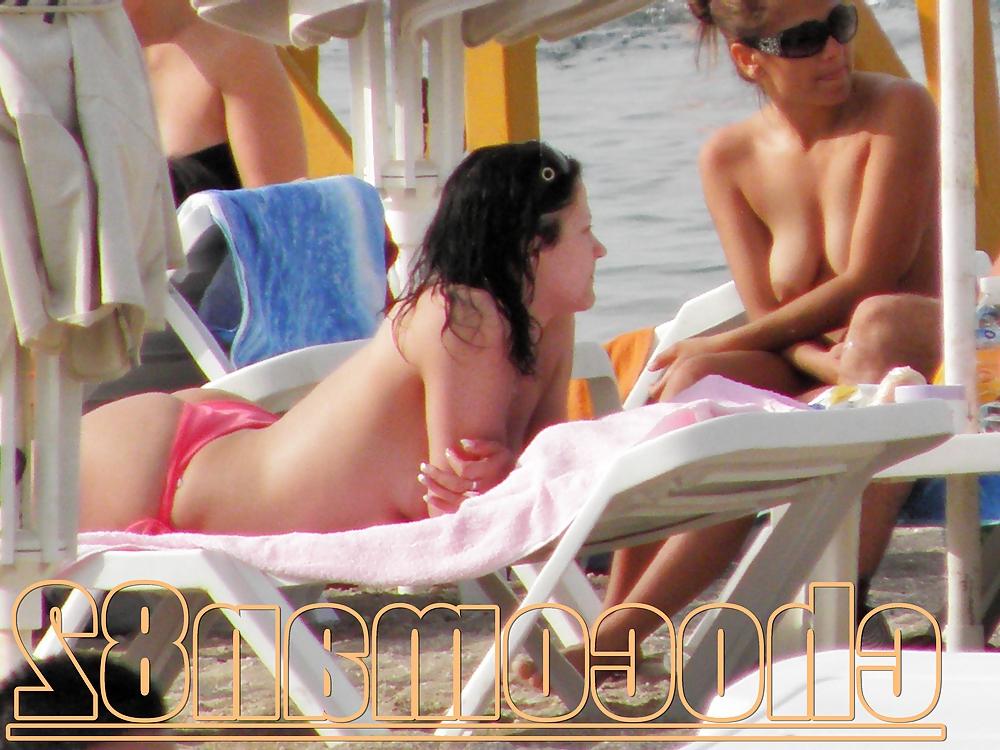 21P Miami beach topless two girls