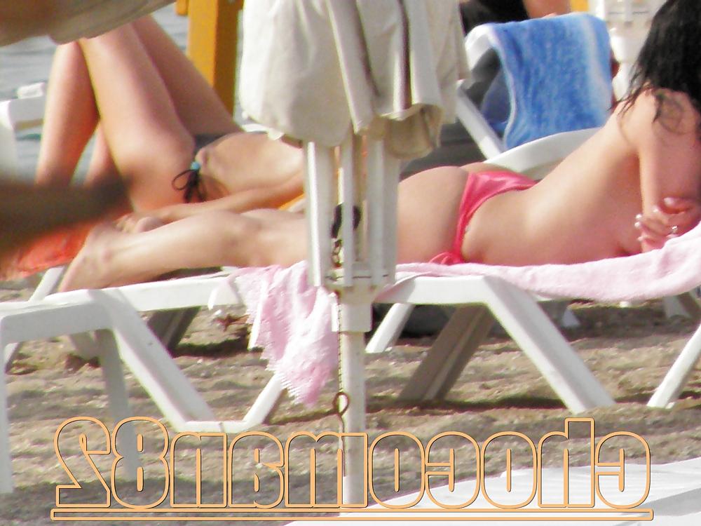 21P Miami beach topless two girls