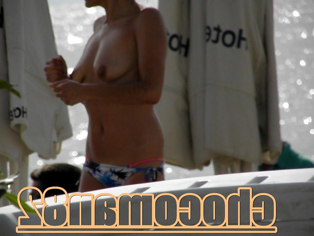 21P Miami beach topless two girls