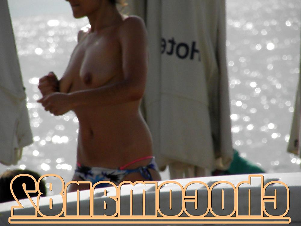 21P Miami beach topless two girls